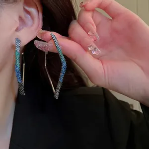 Diamond-studded geometric rhombus hoop earrings with blue-green gradient rhinestones