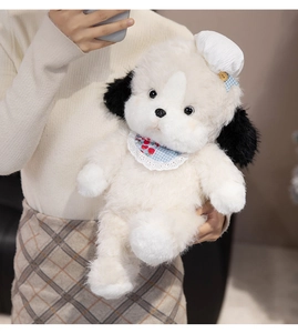 Detail of cute plush puppy toy with blue cherry lace scarf and stylish white hat
