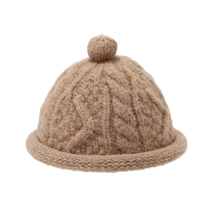 Retro cable knit docker cap in camel brown with a pom-pom and rolled edge for winter