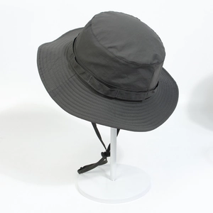 Detail of waterproof outdoor bucket hat in dark grey with adjustable chin strap