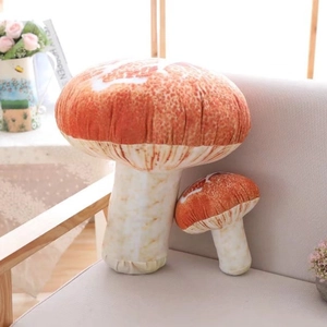 Cute mushroom plush pillows in brown and white, two-piece set on a cozy sofa