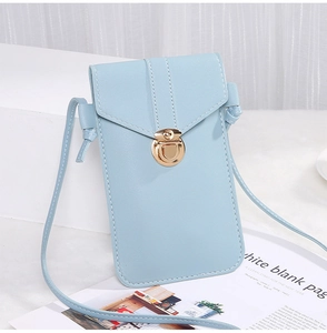 Detailed view of light blue leather phone crossbody bag with gold buckle and white stitching