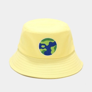 Detail of yellow cotton bucket hat with Earth embroidery and reinforced brim stitching
