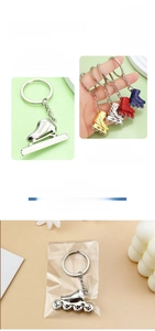 Polished zinc alloy and stainless steel ice skate keychains in four colors