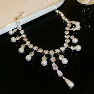 Elegant pearl and teardrop zircon tassel necklace with luxurious silver-tone setting