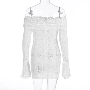 Close-up of white lace mini dress with flared sleeves and sheer floral texture