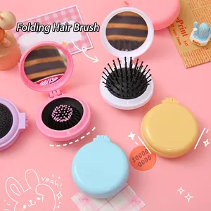 Foldable macaron air cushion hair brush with mirror in assorted candy colors for travel