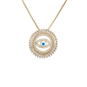 Gold evil eye pendant necklace with micro-pave cubic zirconia on a white background