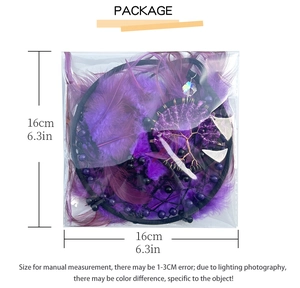 Macro view of purple Tree of Life dreamcatcher with dimensions 16cm x 16cm in packaging