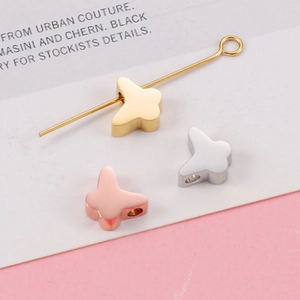 Polished butterfly-shaped stainless steel beads in gold, silver and rose gold for DIY jewelry