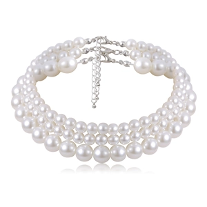 Detail view of the silver lobster clasp and adjustable extension chain on the pearl necklace