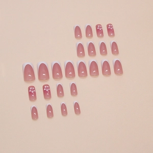Pink gradient French press-on nails set with white floral patterns and 24 square oval pieces