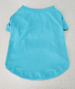 Close-up of blue soft cotton pet t-shirt with crew neck and smooth fabric texture