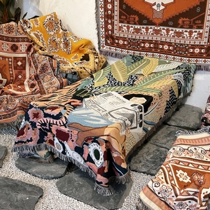 Bohemian cotton throw blanket with tropical leaf patterns and tassels for outdoor camping