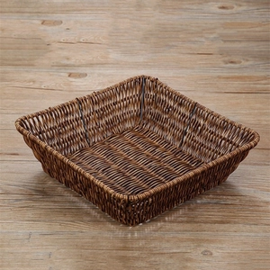 Macro detail of deep brown woven bread basket with intricate square texture and frame