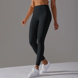 High-waisted black yoga leggings with seamless front for tummy control and booty lift