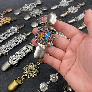 Retro silver cardigan clip with colorful enamel floral pattern and sparkling rhinestones