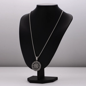Polished silver stainless steel necklace with intricate Celtic knot circular pendant for men