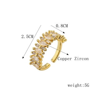 Detailed view of C-shaped copper ear cuff with marquise and rectangular cubic zirconia