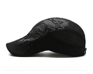 Side view of black quick-dry cap featuring grey dragon print and laser-cut vent holes