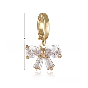 Detail of 18k gold plated bow pendant with micro-inlaid cubic zirconia, 2.4cm in height