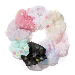 Set of 8 mesh hair scrunchies filled with colorful pom-poms in various pastel colors