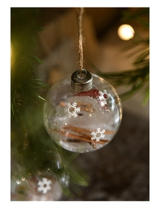 Detail of 8cm clear glass Christmas ball with Santa figurine and snowflake patterns