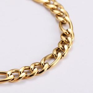 Men's 7mm 18k gold plated stainless steel Figaro chain bracelet on white background