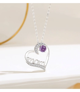 Close-up of S925 silver heart necklace with mom lettering and purple gemstone