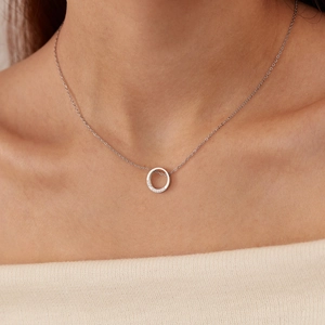 Minimalist silver circle pendant necklace with sparkling pavé crystals for women
