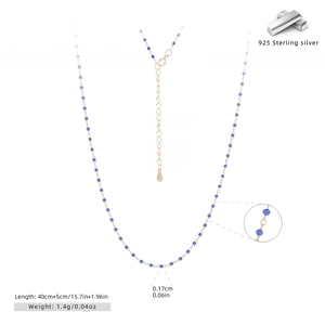 Detail of 925 sterling silver gold necklace with blue beads including size and weight specs