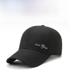 Detail of black baseball cap side featuring white JING PIN SPORT 1985 embroidery