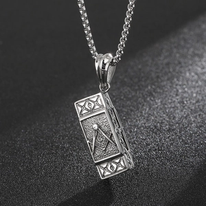 Detail of 316L stainless steel pendant with engraved Freemasonry logo and hallmark