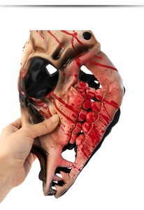 Detailed view of bloody sheep bone mask with realistic red splatter for Halloween cosplay