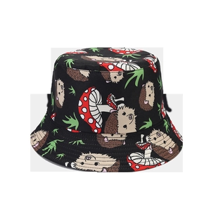 Detail of cartoon hedgehog and mushroom print on black reversible bucket sun hat