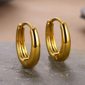 Chic 18k gold plated square titanium hoop earrings displayed on a grey stone base