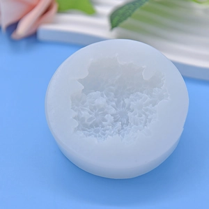 Daisy flower pattern silicone mold for DIY baking and mousse cake on a blue background