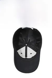 Detail view of the breathable mesh lining and reinforced stitching inside the black baseball cap