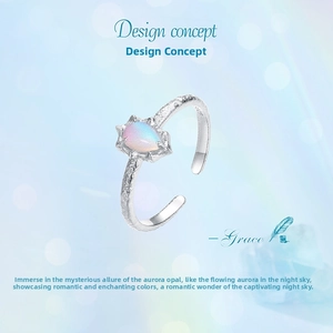 Macro detail of S925 sterling silver ring with pear-shaped aurora opal stone