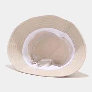 Beige cotton bucket hat with dragonfly embroidery and internal adjustable drawstring