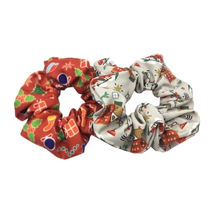 Christmas themed fabric scrunchies set with festive patterns on red and beige textile material