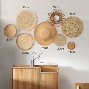 Detailed view of woven seagrass wall decor set showing various sizes and dimensions