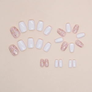 Short square press-on nails with sweet cherry blossom floral patterns and gold foil flakes