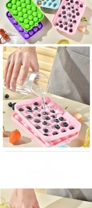 Detailed view of the easy-release silicone round ice ball tray with protective lid