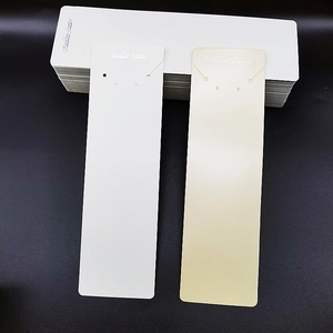 White and beige necklace display cards made of thick paper for jewelry packaging