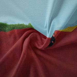 Macro shot of bohemian tapestry fabric showing impressionist oil painting texture