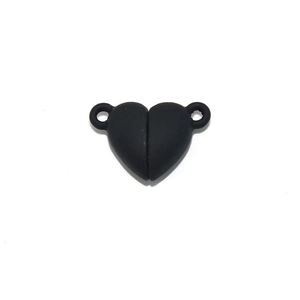 Macro shot of matte black heart-shaped magnetic clasp connectors for bracelets and necklaces