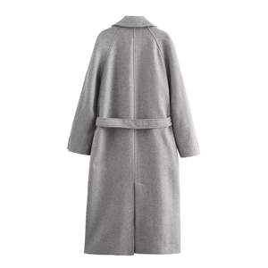 Back view of long grey wool coat featuring textured fabric and matching waist belt