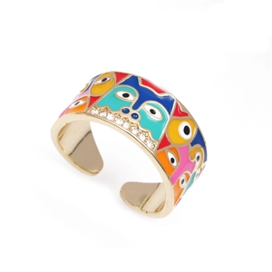 Adjustable gold ring with colorful enamel evil eyes and zircon stones on white background