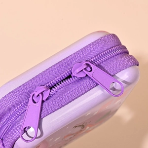 Close-up of purple dinosaur tinplate coin purse zipper closure and sewing details